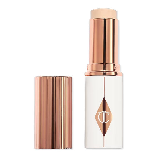 Charlotte Tilbury Unreal Skin Sheer Glow Tint Hydrating Foundation Stick – lightweight foundation stick with sheer glow finish, hydrating formula for flawless natural look, available online in Pakistan at best price
