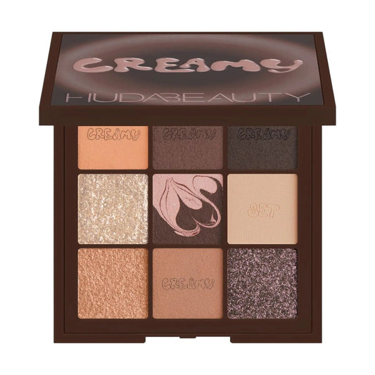 "HUDA BEAUTY Creamy Obsessions Eyeshadow Palette in Neutral Brown with creamy matte and shimmer shades, available online in Pakistan."