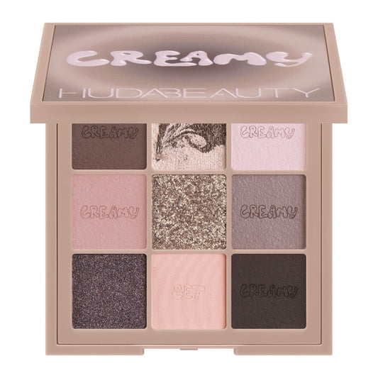 "Buy Huda Beauty Creamy Obsessions Eyeshadow Palette in Pakistan – smooth creamy-textured eyeshadows for flawless blending and stunning glam eye looks."