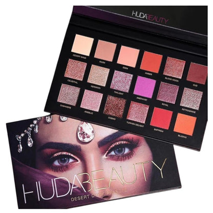 "Buy HUDA BEAUTY Desert Dusk Palette on Sale in Pakistan – original 18-shade eyeshadow palette featuring rich mattes, shimmering pearls, and glittery toppers inspired by Arabian desert sunsets."