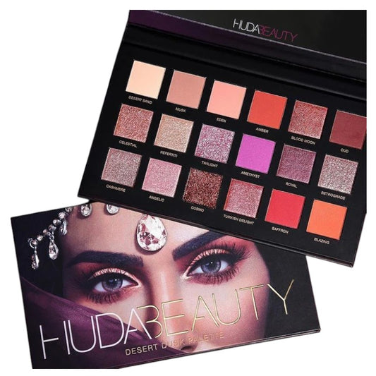 "Buy HUDA BEAUTY Desert Dusk Palette on Sale in Pakistan – original 18-shade eyeshadow palette featuring rich mattes, shimmering pearls, and glittery toppers inspired by Arabian desert sunsets."