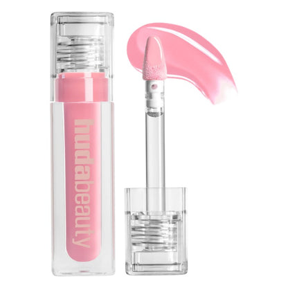 "Buy Huda Beauty FAUXFILLER Gloss UUU-Baby in Pakistan – high-shine plumping lip gloss for fuller, glossy and hydrated lips in a soft nude shade."