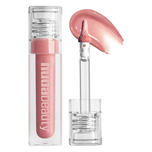 "Buy Huda Beauty Icy Nude FAUXFILLER Lip Gloss in Pakistan – plumping high-shine nude lip gloss that gives fuller, glossy and hydrated lips with a soft icy finish."