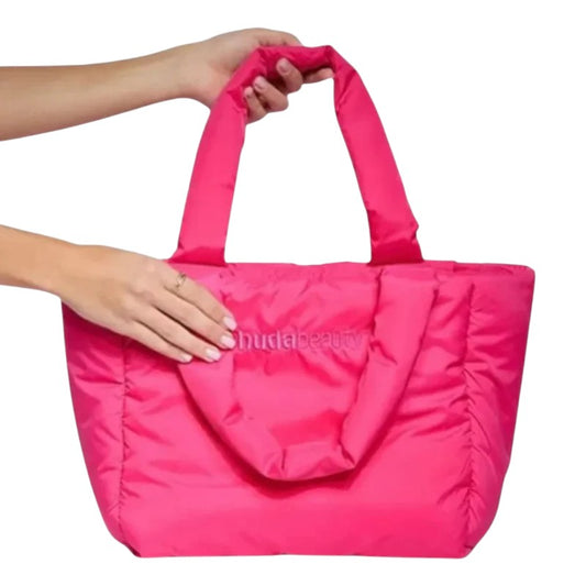 "Huda Beauty Pink Tote Bag – stylish and functional beauty essential for makeup storage, available online in Pakistan."