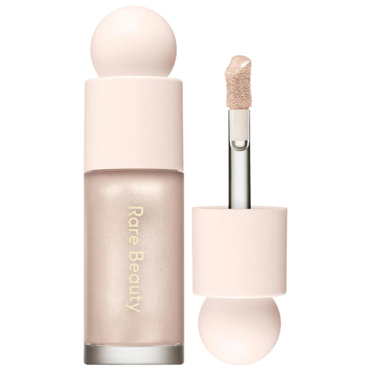 Rare Beauty Positive Light Liquid Luminizer – lightweight liquid highlighter for radiant, glowing skin, long-lasting luminous makeup, available online in Pakistan
